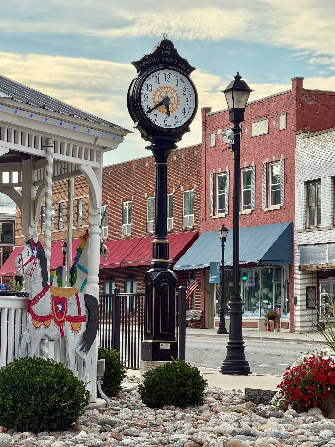 The Lexington Rotary street clock on Main Street, marked Est. 1926 Service Above Self
